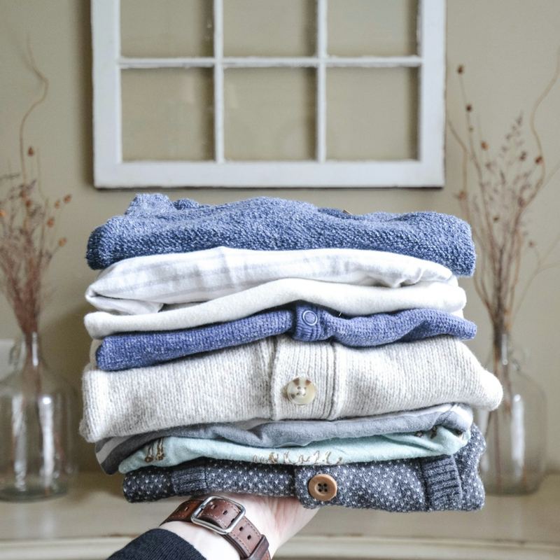 A stack of freshly folded sweaters